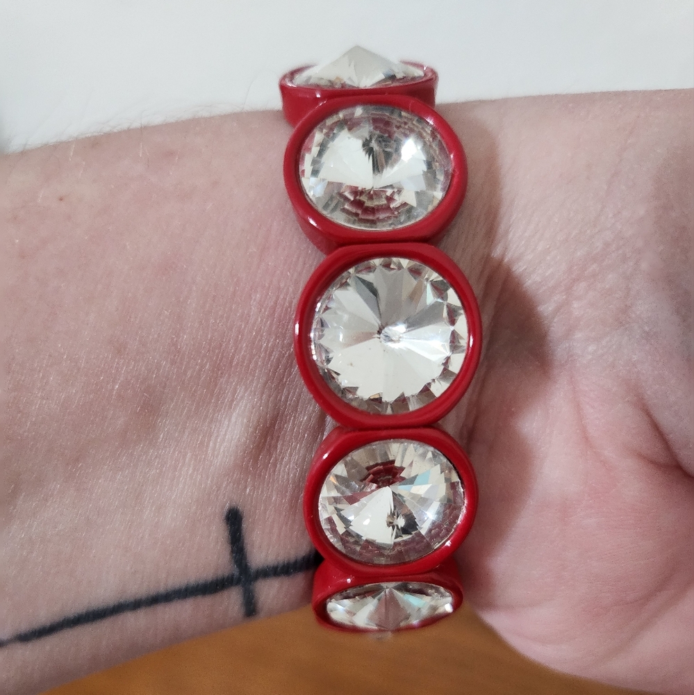 Plunder Design Red Elastic Bracelet with Crystals around it. Excellent Condition